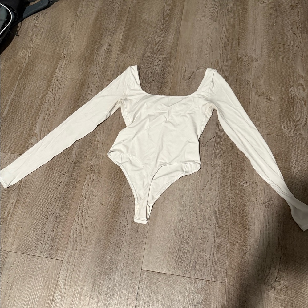 Lululemon Athletica Cream Bodysuit One Piece